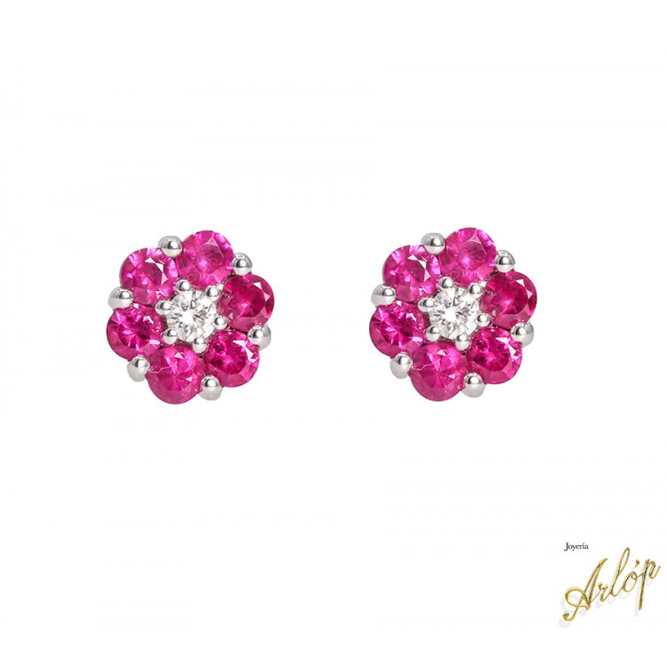 Topos flor en oro blanco de 18 kts. rubies y brillantes.