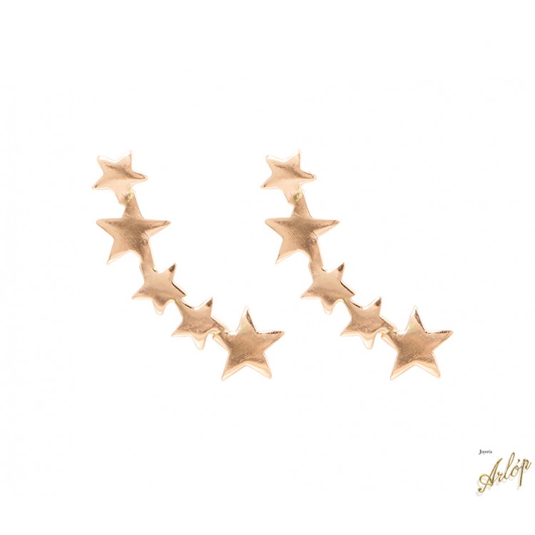 Aretes estrella en oro rojo de 18 Kts. alternando grande y pequeñas.