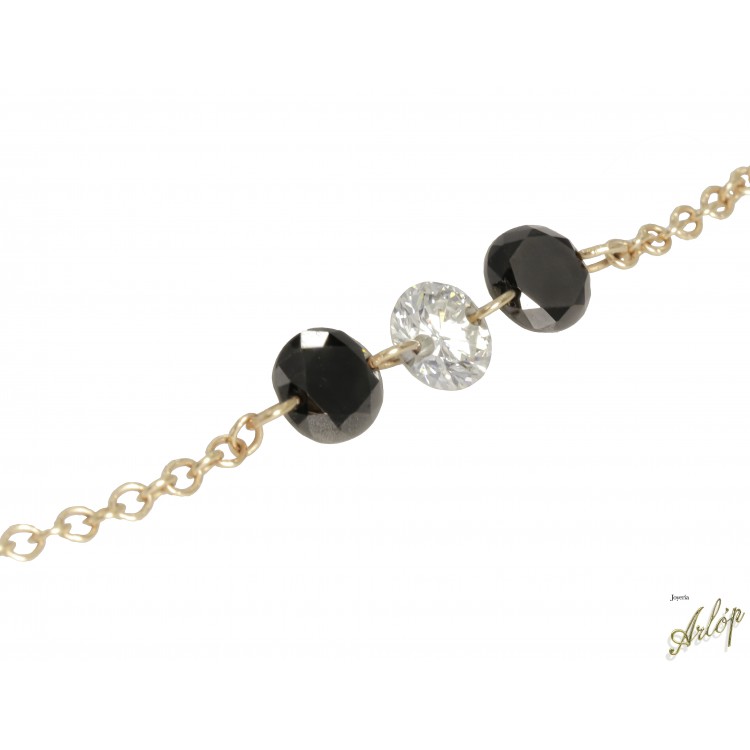 Pulsera en oro rojo de 18 Kts. Con 3 brillantes perforados, 2 de ellos negros
