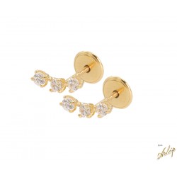 Aretes en oro amarillo tipo ear climber con 3 circones engastados en uñas en oro amarillo de 18 kts